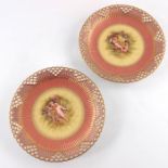 R Hague for Royal Crown Derby, a pair of reticulated cabinet plates