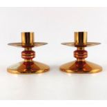 A pair of Modernist gilt bronze and lucite candlesticks