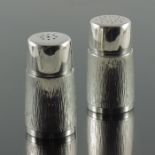 Gerald Benney, a pair of Modernist silver salt and pepper shakers, London 1966