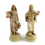 A pair of Austrian parian figures of a water carrier and musician