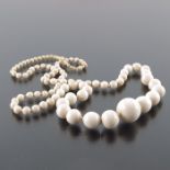 A 19th century ivory bead necklace