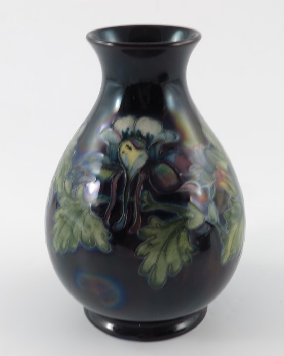 Walter Moorcroft, a Flambe Columbine vase