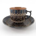 Elizabeth Sayers for Doulton Lambeth, a stoneware cup and saucer