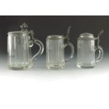 Three 19th century glass steins, including two half and one litre