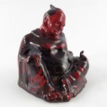 A Royal Doulton figure, Seated Buddha in a Sung glaze, circa 1920,