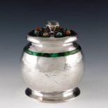 Oliver Baker for Liberty and Co., a Cymric Arts and Crafts silver, enamelled and hardstone set box a