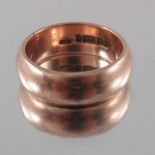 A large 9 carat gold wedding band