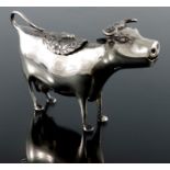 A Dutch silver cow creamer, in the form of a standing cow