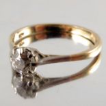 An 18 carat gold and diamond solitaire ring