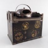 A Japanese white metal and lacquer tea chest