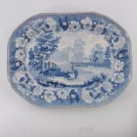 A Swansea blue and white meat platter, early 19th century, Cows crossing a stream