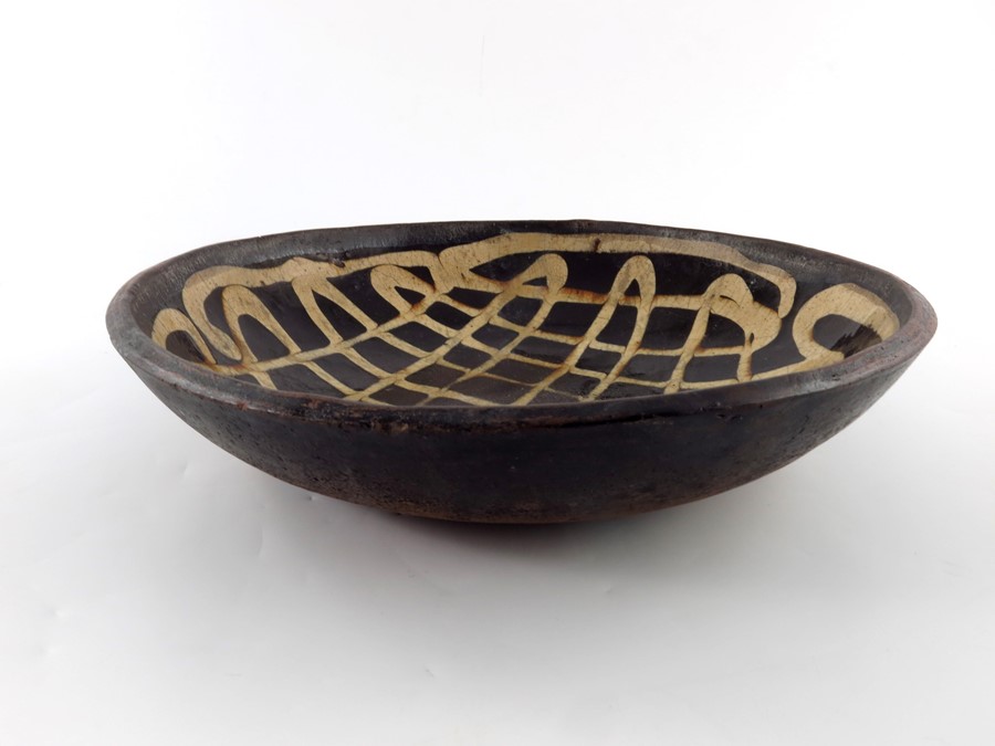 A Staffordshire slipware dish