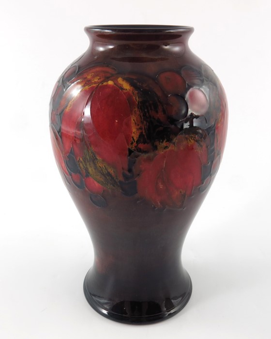 William Moorcroft, a Flambe Leaf and Berry vase, circa 1930