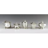Five English silver mustard pots, with date marks from 1901 to 1920, various makers, London, Birming