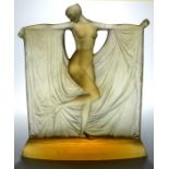 Rene Lalique, a Suzanne glass figure, model 833, designed circa 1925, amber