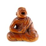 A Japanese carved wood netsuke, Gyokuzan