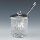 A George V silver topped glass preserve pot and a spoon, W J Myatt and Co., Birmingham 1921