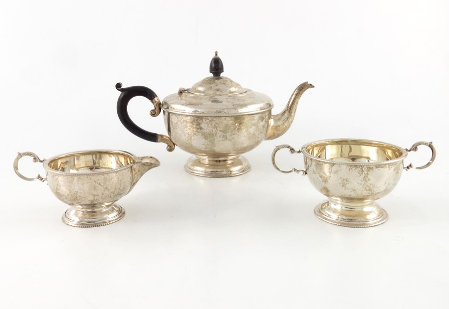 A George V silver three piece tea set,