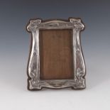 An Arts and Crafts silver photo frame, J Aitkin and Son, Birmingham 1904