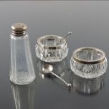 A pair of Edwardian silver mounted and cut glass salt cellars
