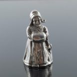 A Continental silver figural bell, modelled as a Dutch girl