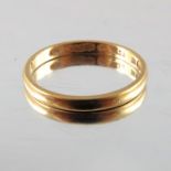 A 22 carat gold wedding band