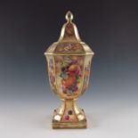 D Fuller for Royal Worcester, a fruit painted pedestal vase and cover