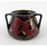 William Moorcroft, a Pomegranate on ochre vase