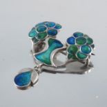Murrle Bennett and Co., an Arts and Crafts silver and enamelled brooch