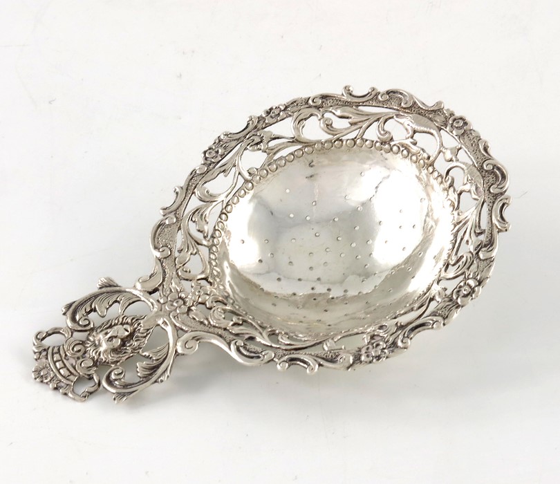 An Edwardian Dutch silver tea strainer, Bethold Muller