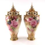 Jarman for Royal Worcester, a pair of rose painted vases and cover
