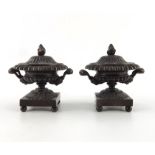 A pair of 19th century French bronze inkwells