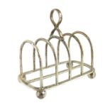 A George V silver four division toast rack, Goldsmiths and Silversmiths Company