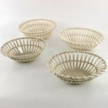 Four creamware strapwork baskets