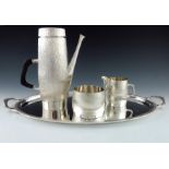 Christopher Lawrence for Asprey and Co., a Modernist silver four piece coffee set