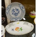 A Meissen oval dish, reticulated border reserving