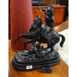 Cast spelter figure, Celtic warrior on horseback, on oval