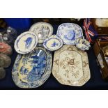 Three blue and white meat plates, a sepia patterne