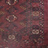 A Caucasian style rug, geometric pattern to a rust