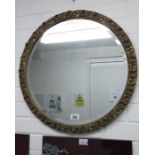 Circular gilt framed bevel edged wall mirror, moul