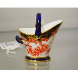 A Royal Crown Derby miniature coal bucket, patter