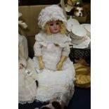 Armand Marseille doll, porcelain head with brown g