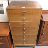 A 1940's oak veneered music cabinet, fitted eight