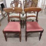 A pair of 19th century mahogany dining chairs, on