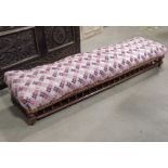 An Edwardian footstool with spindle turned gallery