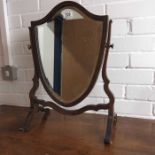 A Shield shaped mahogany and boxwood inlaid toilet