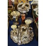 A plated pedestal bowl, flatware. twin handled tro
