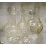 Four cut glass decanters and stoppers, a cut glass