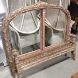 Two pairs of carved giltwood single bed ends, arch