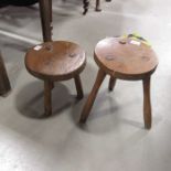 A Rustic farmhouse circular three legged stool, 36